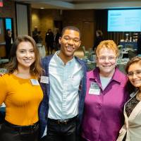 Lynn "Chick" Blue posing with scholarship students at Scholarship Dinner 2019